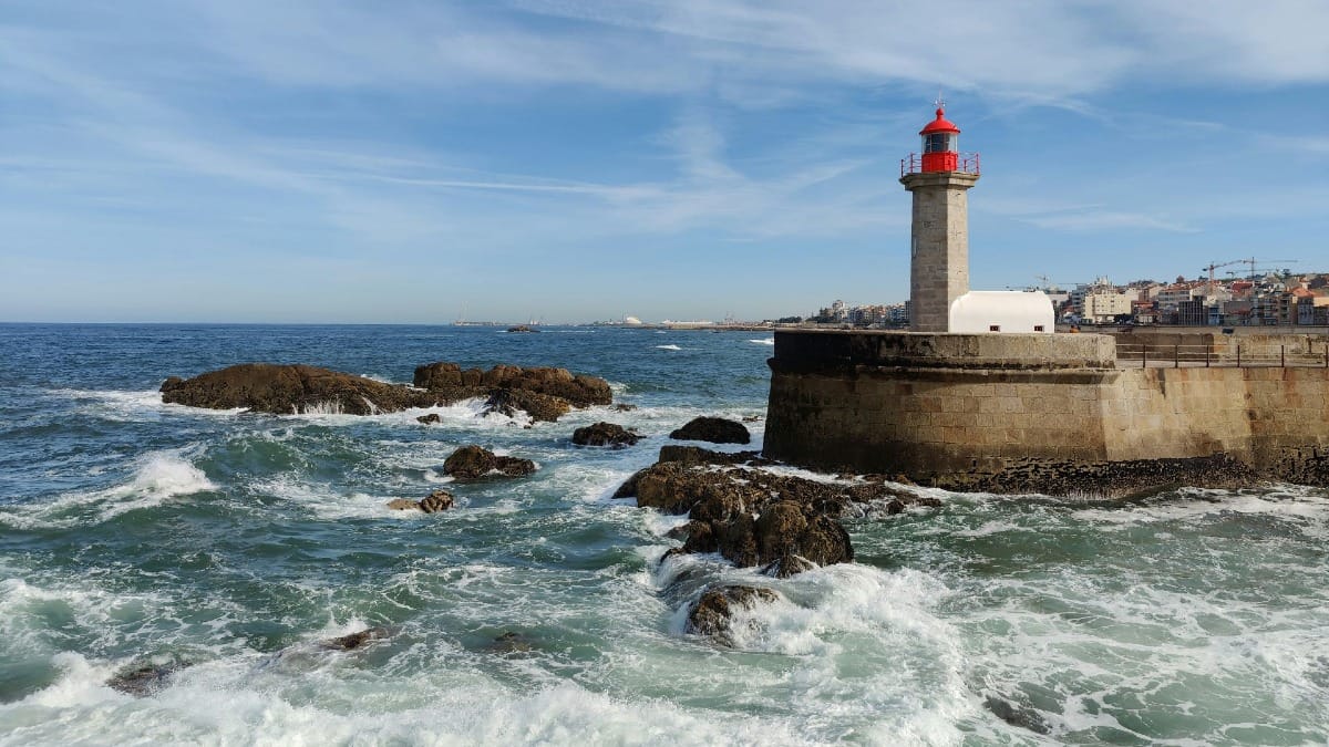 View of the Felgueiras Lighthouse (Farolim de Felgueiras) at Foz do Douro, a highlight of the electric bike tour along Porto’s riverbank and coastline