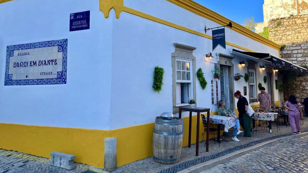 Authentic tavern with outdoor tables and local ambiance in the heart of Faro Old Town