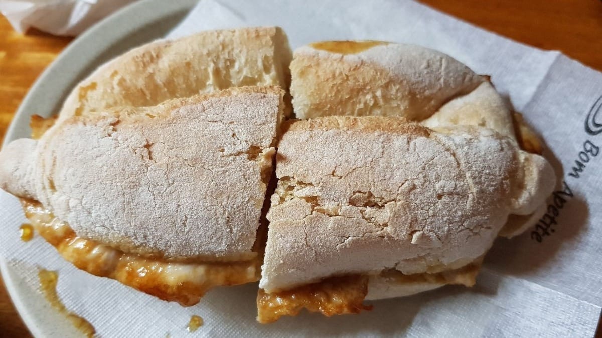Traditional Portuguese bifana sandwich served in a local Faro eatery during the food tour