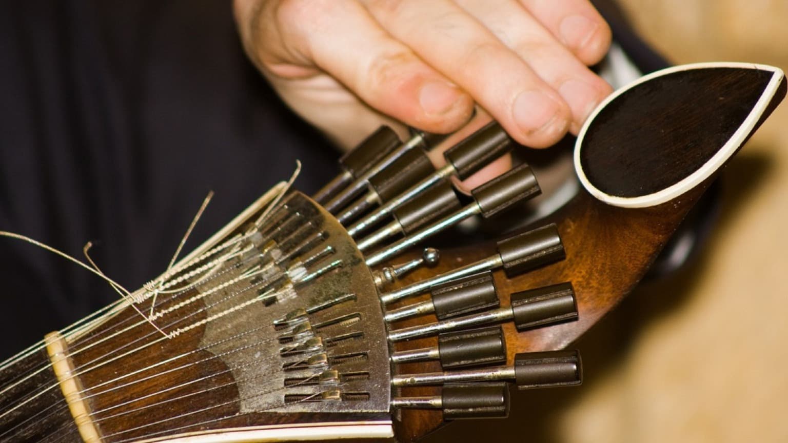 Close-up of a Coimbra-style Portuguese guitar used in Coimbra Fado performances