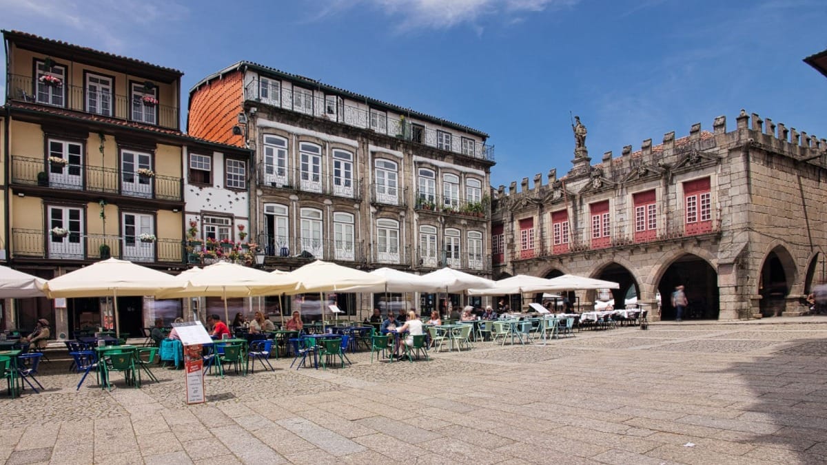 Walking through the historical center of Guimarães, a UNESCO World Heritage Site, during a tour with Cooltour Oporto